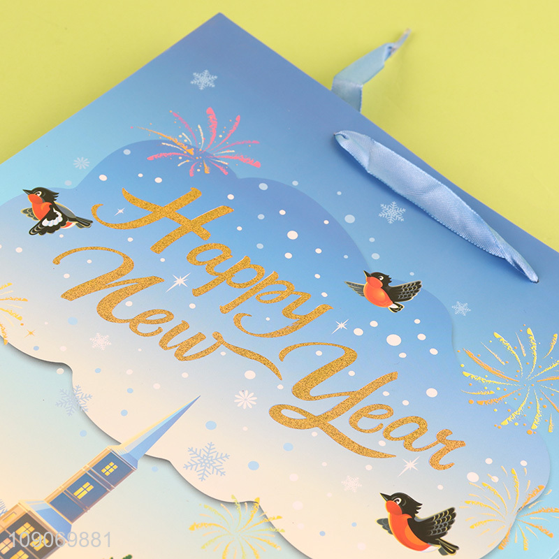 Yiwu market happy new year gifts packaging paper bag for sale