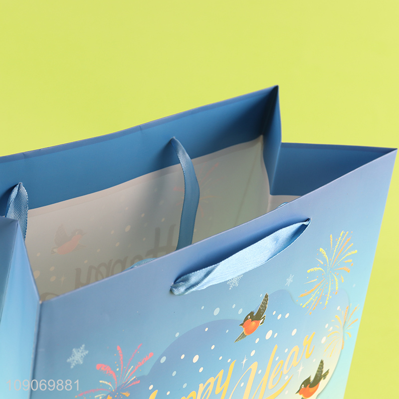 Yiwu market happy new year gifts packaging paper bag for sale