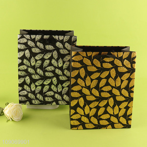 Best price leaves pattern eco-friendly gifts packaging <em>paper</em> <em>bag</em>