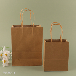 Good Quality Kraft <em>Paper</em> Gift Bag with <em>Handles</em> for Birthday Party Favors