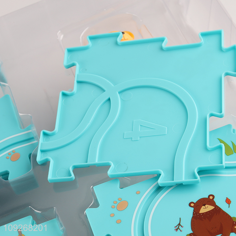 Yiwu market cartoon children puzzle game electric rail car toys for sale