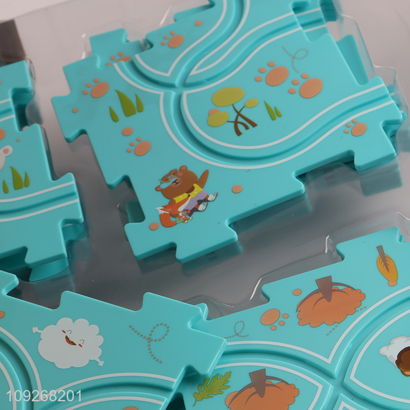 Yiwu market cartoon children puzzle game electric rail car toys for sale