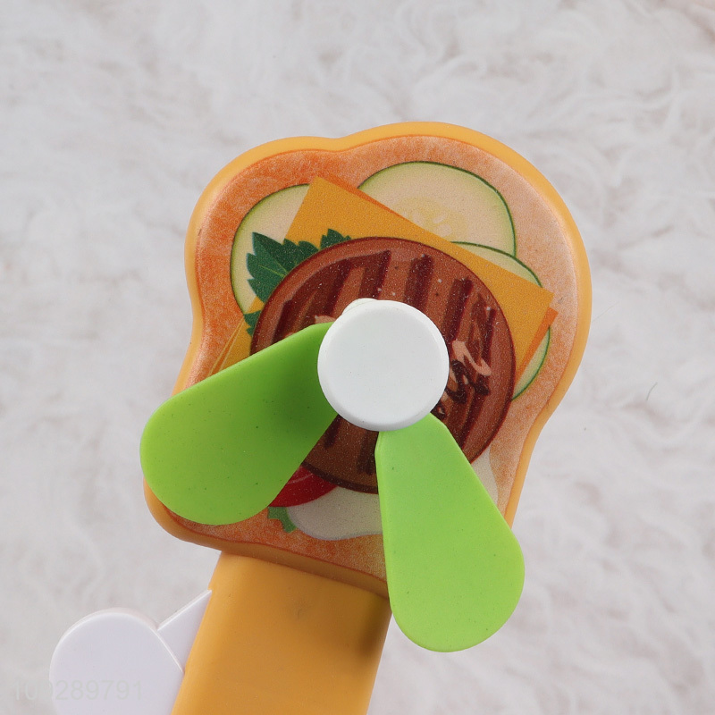 Online wholesale portable plastic cartoon handheld fan