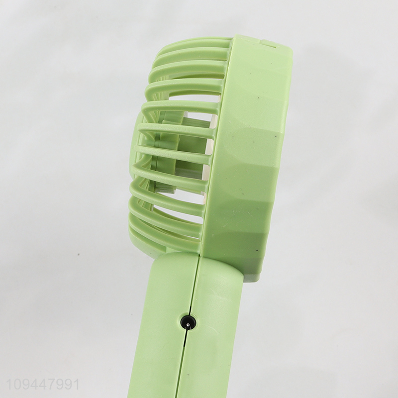 Low price cartoon handheld mini electric fan for sale